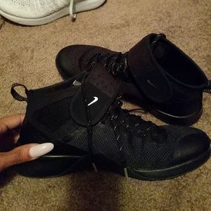 Black and silver Nikes